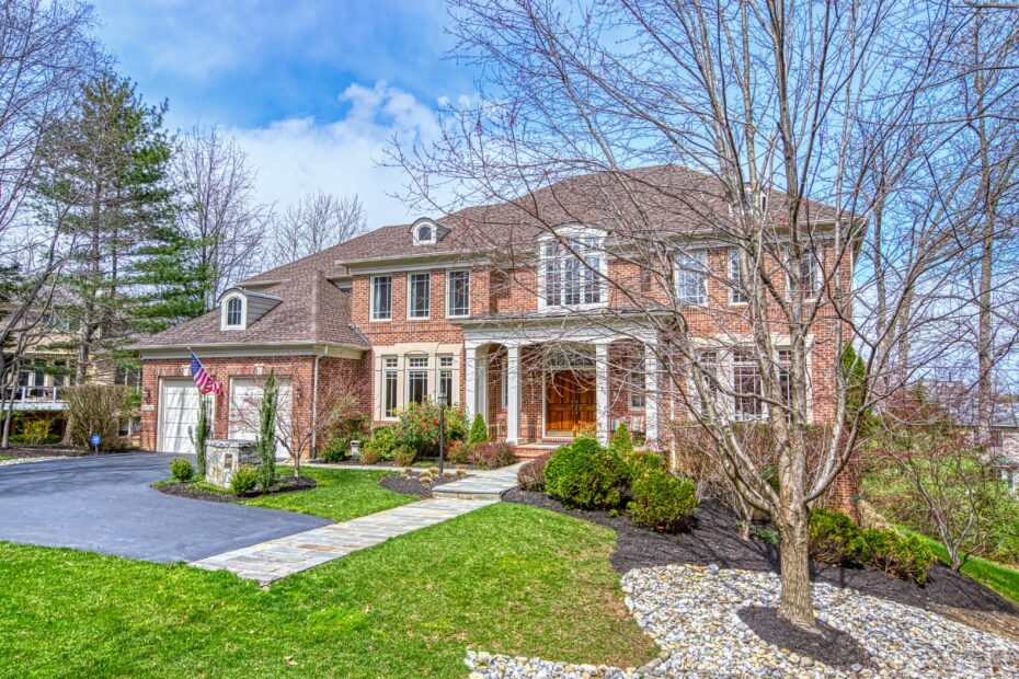 all brick impressive home, shot on an angle in Reston, Virginia