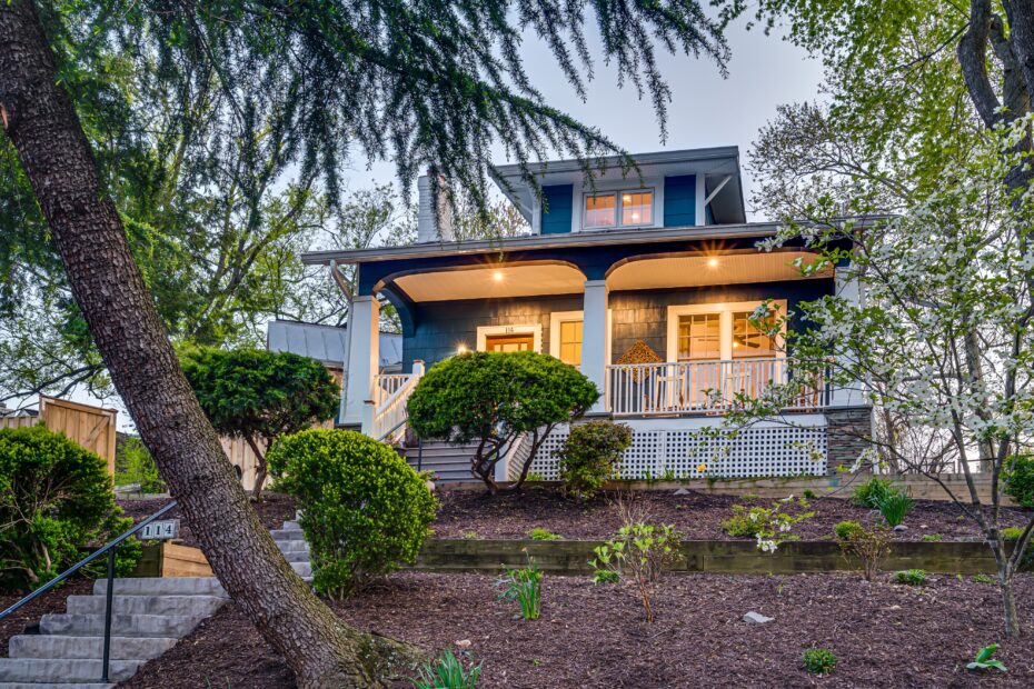 front of beautiful renovated bungalow at dusk in Arlington, Virginia