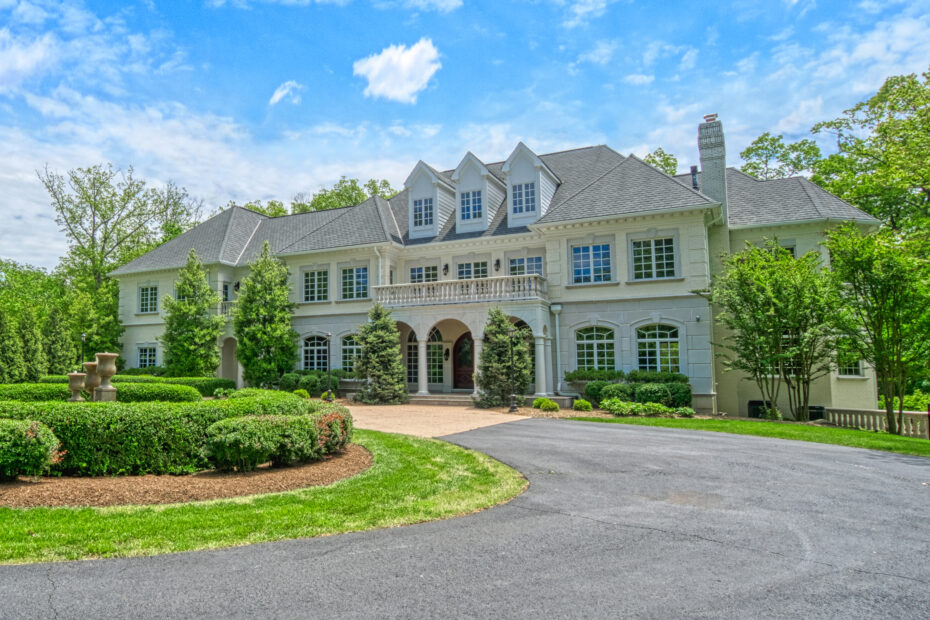 luxury white brick estate home